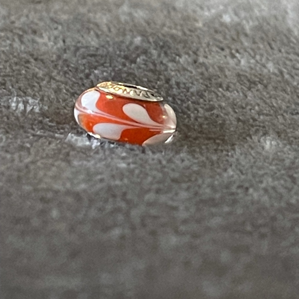 Pandora orange and white swirl murano charm